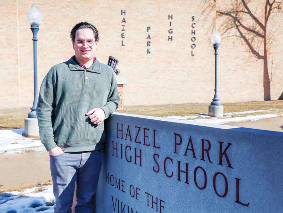 Director Fernando Monge standing in front of Hazel Park High School